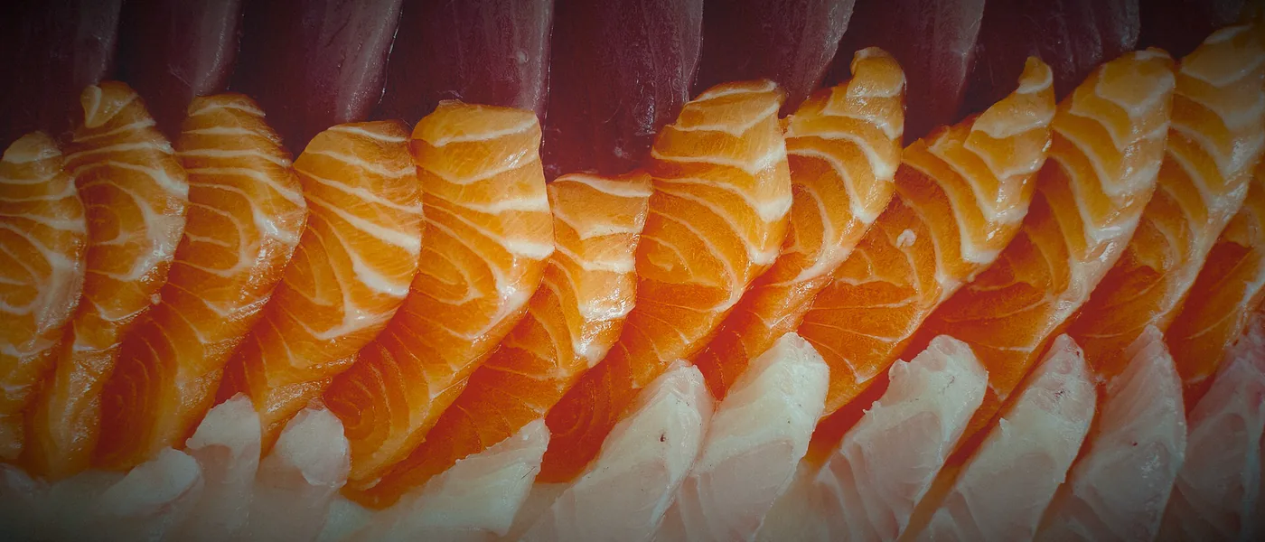 Rows of salmon and tuna sashimi